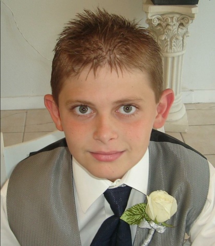 At his Dads wedding.
